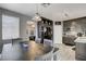 Open-concept kitchen and dining area with stainless steel appliances and lots of natural light at 190 Mount Saint Helens Dr, Henderson, NV 89012