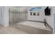 Bright primary bathroom with an oversized tub and luxurious shower at 1945 Canyon Highlands Dr, Henderson, NV 89052