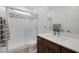 Modern bathroom with a glass enclosed shower and neutral color palette at 1945 Canyon Highlands Dr, Henderson, NV 89052