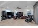 Bright office area with tile floors, ceiling fan, a large window and comfortable ergonomic seating at 1945 Canyon Highlands Dr, Henderson, NV 89052