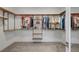 Spacious walk-in closet with custom shelving and ample storage space for clothes and accessories at 1945 Canyon Highlands Dr, Henderson, NV 89052