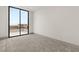 Spacious, bright bedroom with access to a private balcony at 21 Grey Owl Ct, Las Vegas, NV 89135