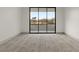 Spacious, bright bedroom with access to a private balcony and mountain view at 21 Grey Owl Ct, Las Vegas, NV 89135