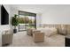 Bright main bedroom features a large window, plush seating, and a comfortable king-sized bed at 21 Grey Owl Ct, Las Vegas, NV 89135