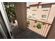 Balcony view overlooking the outdoor stairs with iron rails and the building exteriors at 2110 Los Feliz St # 2052, Las Vegas, NV 89156