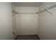 Walk-in closet with carpet floors and adjustable shelving for optimal storage in this home at 2110 Los Feliz St # 2052, Las Vegas, NV 89156