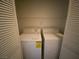 Washer and dryer appliances inside a laundry area with folding doors, saving space and adding convenience at 2110 Los Feliz St # 2052, Las Vegas, NV 89156