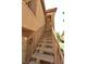 Close up of tan outdoor staircase leading to apartments in the building at 2110 Los Feliz St # 2052, Las Vegas, NV 89156
