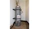 A water heater, ready to provide hot water, is securely installed in this home's utility area at 2110 Los Feliz St # 2052, Las Vegas, NV 89156