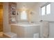 Spa-like bathroom with a large corner bathtub and separate shower at 2179 Bridlewood Dr, Las Vegas, NV 89119