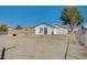 Large gravel area behind the house at 2690 S Dandelion St, Pahrump, NV 89048