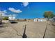 Spacious backyard with gravel and RV parking at 2690 S Dandelion St, Pahrump, NV 89048