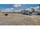 Large gravel area, RV parking, and storage shed at 2690 S Dandelion St, Pahrump, NV 89048