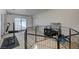 Multi-purpose basement room with pet enclosures and exercise equipment at 2690 S Dandelion St, Pahrump, NV 89048