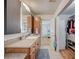 Bathroom featuring a vanity, walk-in closet, and shower at 2690 S Dandelion St, Pahrump, NV 89048
