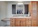 Bathroom with a large vanity, mirror, and ample storage at 2690 S Dandelion St, Pahrump, NV 89048