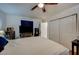 Spacious bedroom with large bed and ceiling fan at 2690 S Dandelion St, Pahrump, NV 89048