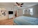 Bright bedroom with light blue bedding and a white dresser at 2690 S Dandelion St, Pahrump, NV 89048