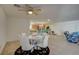 Dining area with a round table and chairs, adjacent to the kitchen at 2690 S Dandelion St, Pahrump, NV 89048