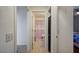 Hallway view of bathroom with lavender accents at 2690 S Dandelion St, Pahrump, NV 89048