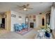 Living area featuring comfy armchairs and a ceiling fan at 2690 S Dandelion St, Pahrump, NV 89048