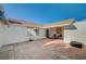 Outdoor patio area with tile flooring and seating at 2690 S Dandelion St, Pahrump, NV 89048