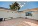 Spacious backyard patio with tile flooring and a bench at 2690 S Dandelion St, Pahrump, NV 89048