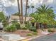 Well-maintained community building with palm trees at 3055 Key Largo Dr # 203, Las Vegas, NV 89120