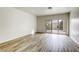 Bright living room with sliding glass door leading to backyard at 448 Wonderstone Dr, Las Vegas, NV 89107