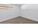 Simple bedroom with neutral wall and carpet flooring at 4554 S Nellis Blvd, Las Vegas, NV 89121