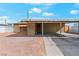 House exterior featuring carport and landscaped yard at 4554 S Nellis Blvd, Las Vegas, NV 89121
