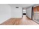 Living room with hardwood floors and view into kitchen at 4554 S Nellis Blvd, Las Vegas, NV 89121