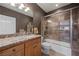 Bathroom with granite vanity, tiled shower, and bathtub at 479 Via Ventana Dr, Mesquite, NV 89027