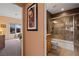 Bathroom with shower/tub combo, wood vanity, and tile flooring at 479 Via Ventana Dr, Mesquite, NV 89027