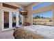 Primary bedroom with serene golf course views and patio access at 479 Via Ventana Dr, Mesquite, NV 89027