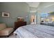Main bedroom with king bed, dresser, and sitting area at 479 Via Ventana Dr, Mesquite, NV 89027
