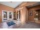 Bright entryway with tile floor, double doors opening to a patio, and a full bath at 479 Via Ventana Dr, Mesquite, NV 89027