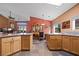 L-shaped kitchen with granite countertops and stainless steel appliances at 479 Via Ventana Dr, Mesquite, NV 89027