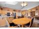 Open kitchen with granite countertops, stainless steel appliances, and a breakfast nook at 479 Via Ventana Dr, Mesquite, NV 89027