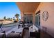Relaxing patio features comfortable seating and access to the house at 479 Via Ventana Dr, Mesquite, NV 89027
