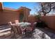 Relaxing patio featuring a table and chairs, perfect for outdoor dining at 479 Via Ventana Dr, Mesquite, NV 89027