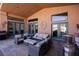 Covered patio boasts seating, grill, and access to interior at 479 Via Ventana Dr, Mesquite, NV 89027