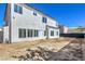 View of the backyard showcasing the home's exterior and backyard space at 4871 Charlemagne Ave, Las Vegas, NV 89130