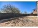 Expansive backyard featuring a block wall fence for added privacy and a blank canvas ready for landscaping at 4871 Charlemagne Ave, Las Vegas, NV 89130