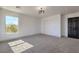 Bedroom with bright natural light, a closet, and a contemporary light fixture at 4871 Charlemagne Ave, Las Vegas, NV 89130