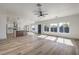 Spacious living area with abundant natural light showcasing the open floor plan and modern finishes at 4871 Charlemagne Ave, Las Vegas, NV 89130