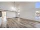 Spacious living room with hardwood floors, high ceilings, and natural light at 4871 Charlemagne Ave, Las Vegas, NV 89130