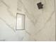 Elegant shower with marble-style wall tiles at 4871 Charlemagne Ave, Las Vegas, NV 89130