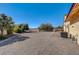 Spacious backyard with gravel and mountain views at 5105 Kingsbridge Dr, Las Vegas, NV 89130