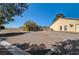 Large gravel backyard with mountain views at 5105 Kingsbridge Dr, Las Vegas, NV 89130